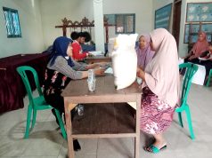 Penyaluran Bantuan Beras 10 Kg/KPM Di Desa Demangan