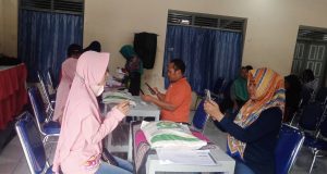 Penyaluran Bantuan Pangan Beras Di Desa Tanjung.