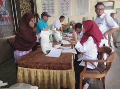 Penyaluran Bantuan Pangan Berupa Beras Di Desa Serenan.
