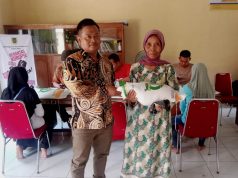 Penyaluran Bantuan Pangan Beras Bulan Juni 2024 Di Desa Kenaiban
