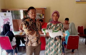 Penyaluran Bantuan Pangan Beras Bulan Juni 2024 Di Desa Kenaiban
