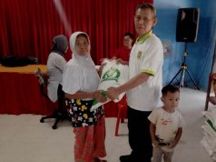 Penyaluran Bantuan Pangan Beras 10 Kg Bulan Juni 2024 Di Desa Sentono .